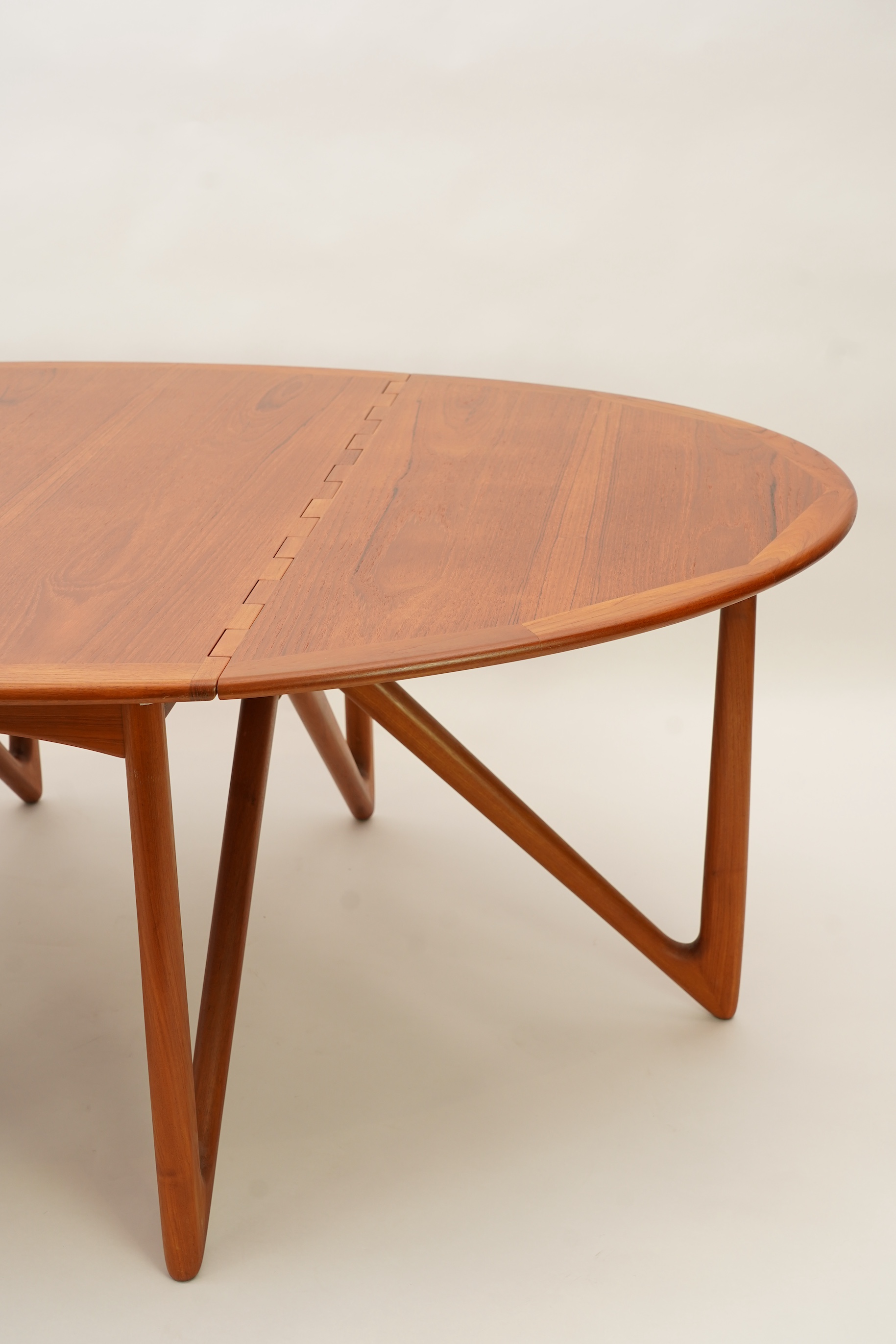 Niels Koefoed (Danish, b. 1929) for Koefoeds Møbelfabrik: A teak 'Oval Klap' dining table